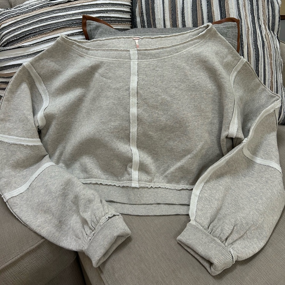 Free People wide neck grey sweatshirt.
